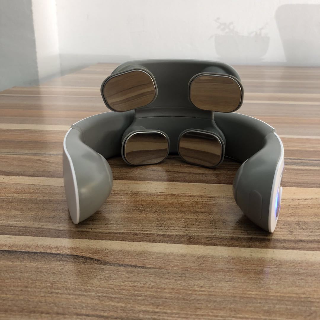 Hands-free electric neck and shoulder massager with ergonomic design